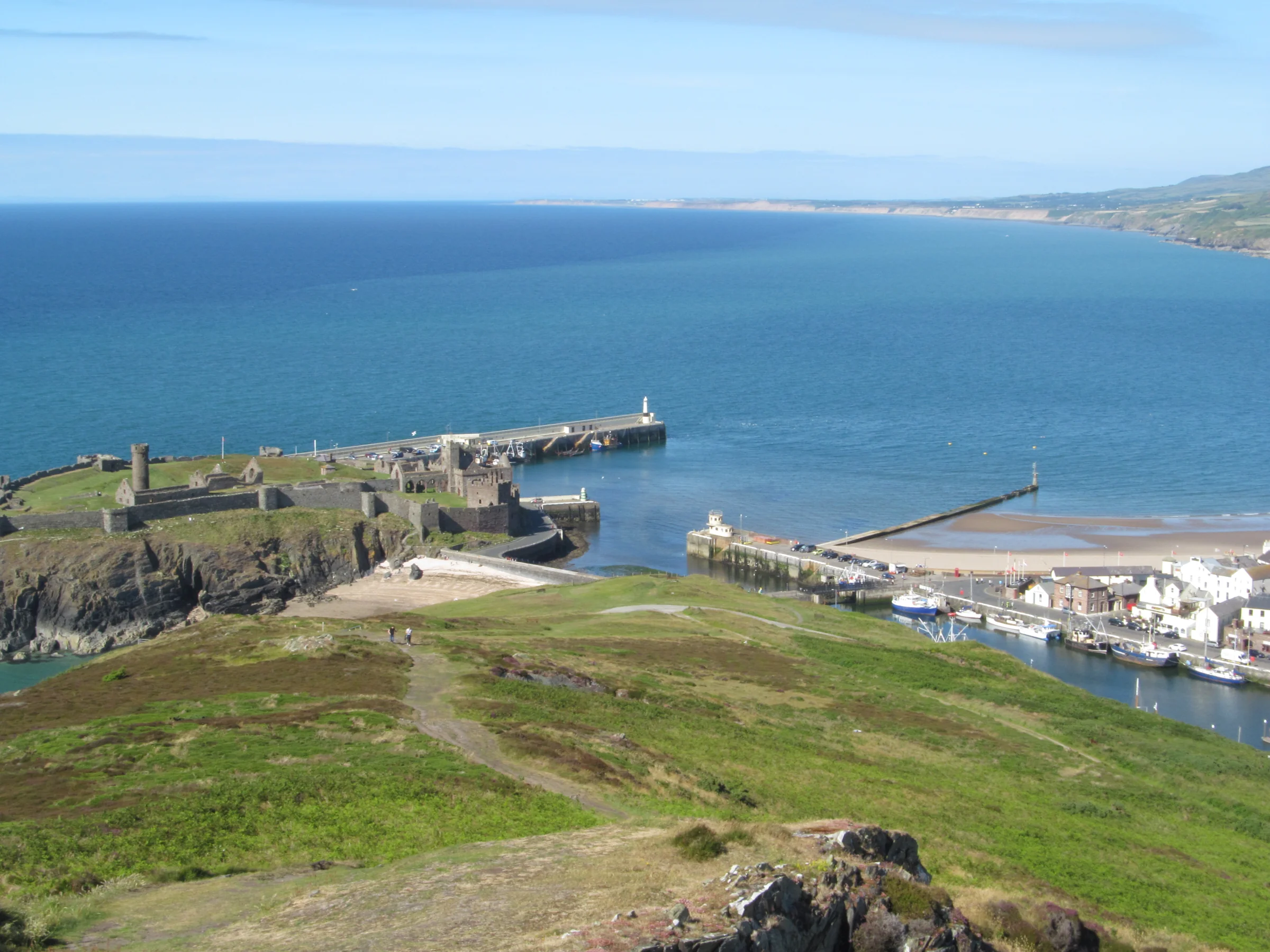 Peel Castle, harbour and coastline viewed from Peel Hill, Isle of Man